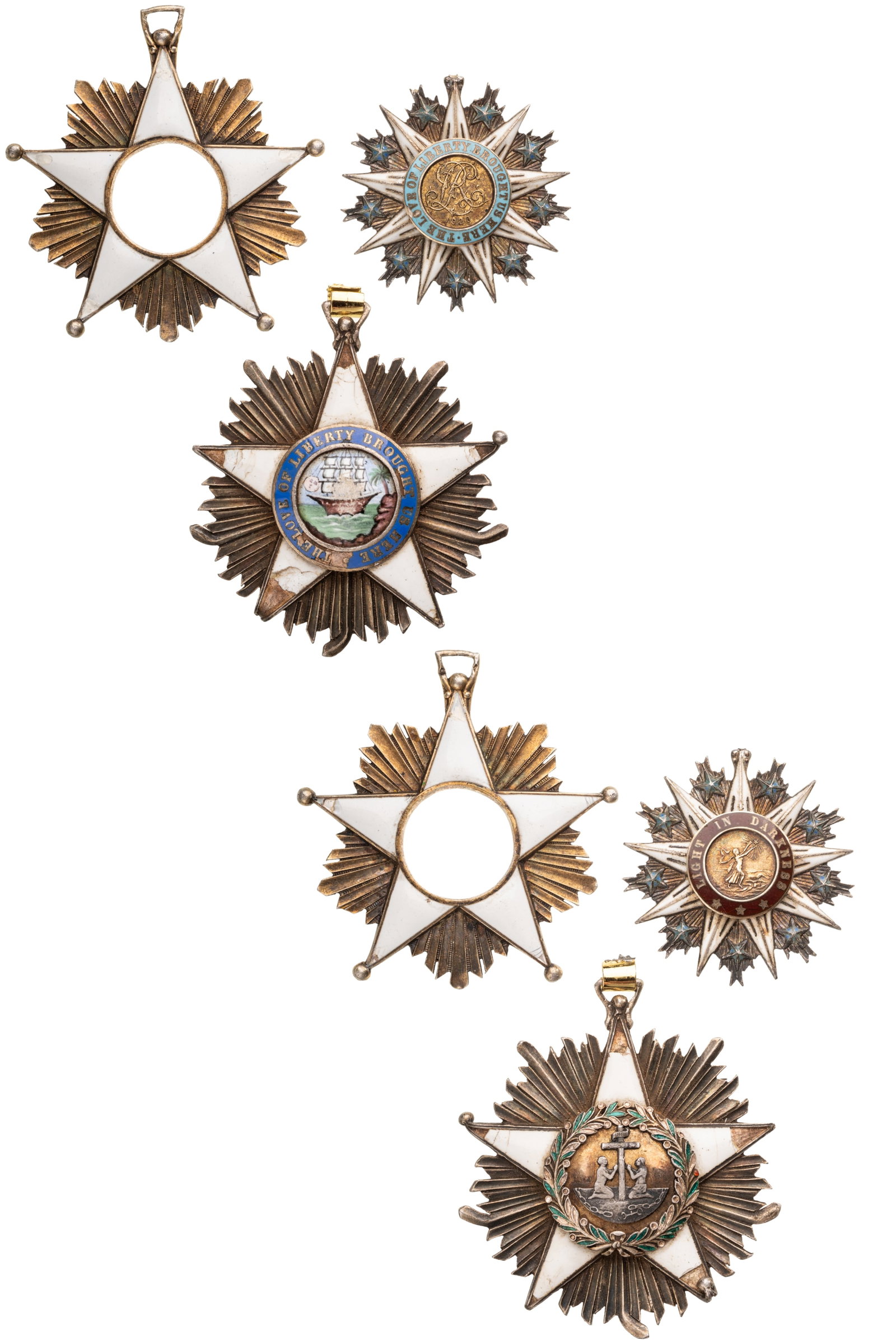 Order of The Star Of Africa and Order of the African Redemption: Lot of 3. Order of the African Redemption, Commander's Cross (2), instituted in 1920. Neck Badges, 65x58 mm, gilt Silver, both sides enameled (damages and ball points missing), one with centers missin