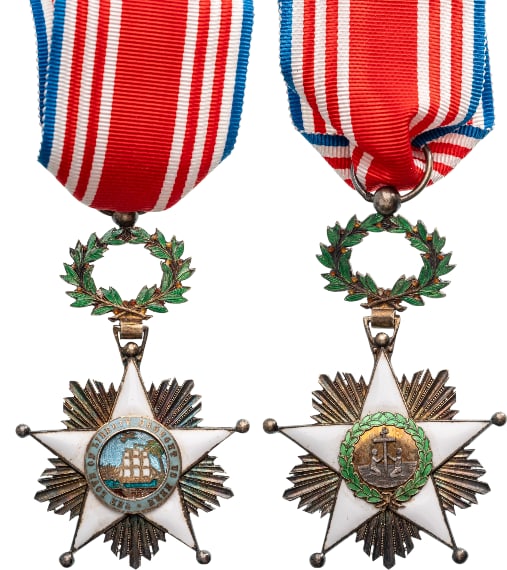 ORDER OF THE AFRICAN REDEMPTION: Knight's Cross, instittued in 1879. Breast Badge, 69x43 mm., Silver, enameled, original suspension ring and ribbon. An attractive order, in best condition and quality! I