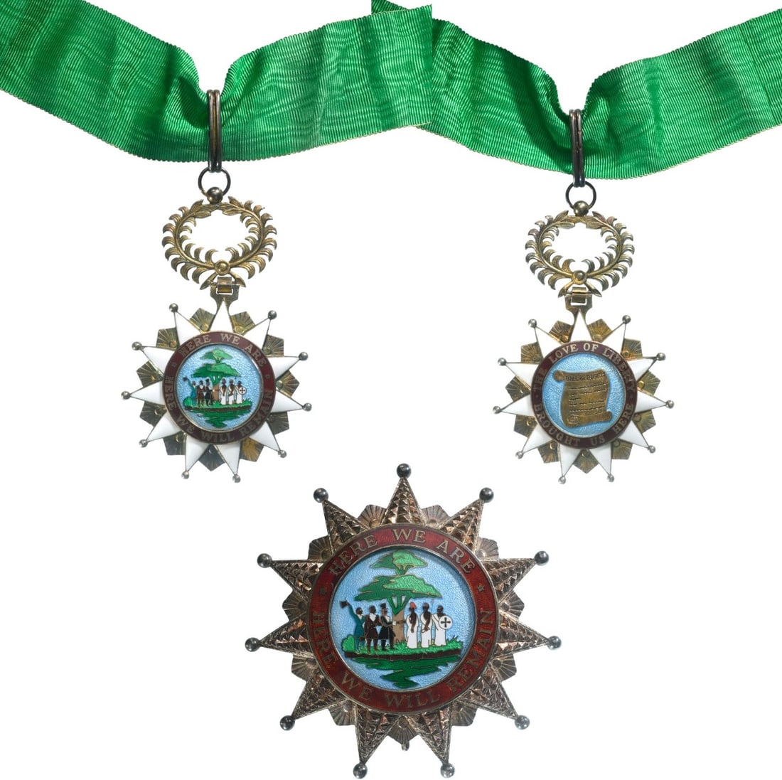 Order of the Pioneers of Liberia: Grand Officers Set, 2nd Class, instituted in 1955. Neck Badge, 95x60 mm, gilt Silver, both sides enameled, central medallion gilt, enameled, original suspension device, ring, loop and ribbon. Breast