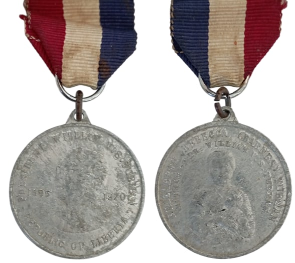 Commemorative Medal of President William V. S. Tubman, 1896 - 1970: Breast Badge, 35x32 mm, Aluminium, original suspension ring and ribbon. Very fine condition! II