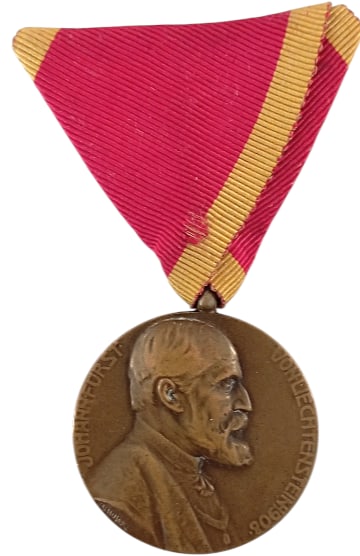 Medal for the 50th Anniversary of Reign of Prince Johann von Liechtenstein, 1908, by L. Hujer: Breast Badge, 41x36 mm, Bronze, original suspension ring and ribbon. Extremely fine condition! I