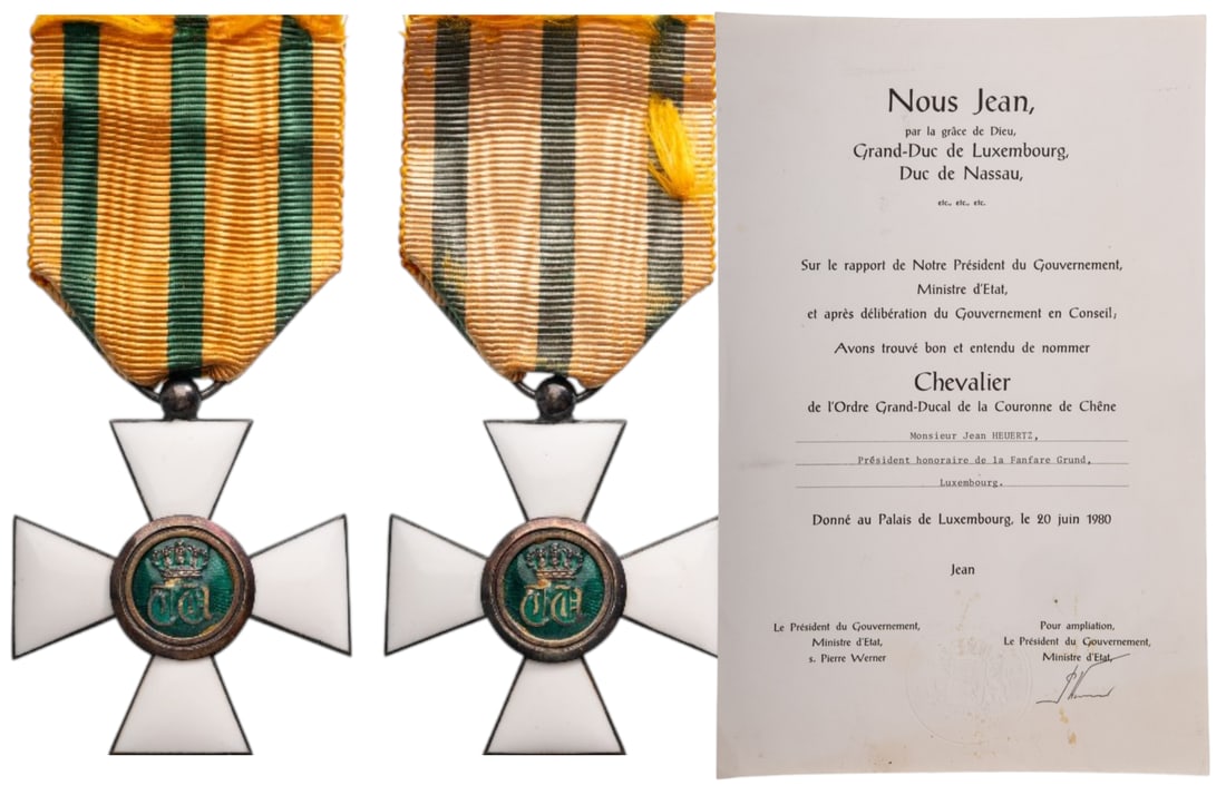 The Order of the Oak Crown: Knight's Cross, instittued in 1841. Breast Badge, 45x40 mm., Silver, enameled, original suspension ring and ribbon, together with awarding document to the President of the fanfare, dated 20th of June 