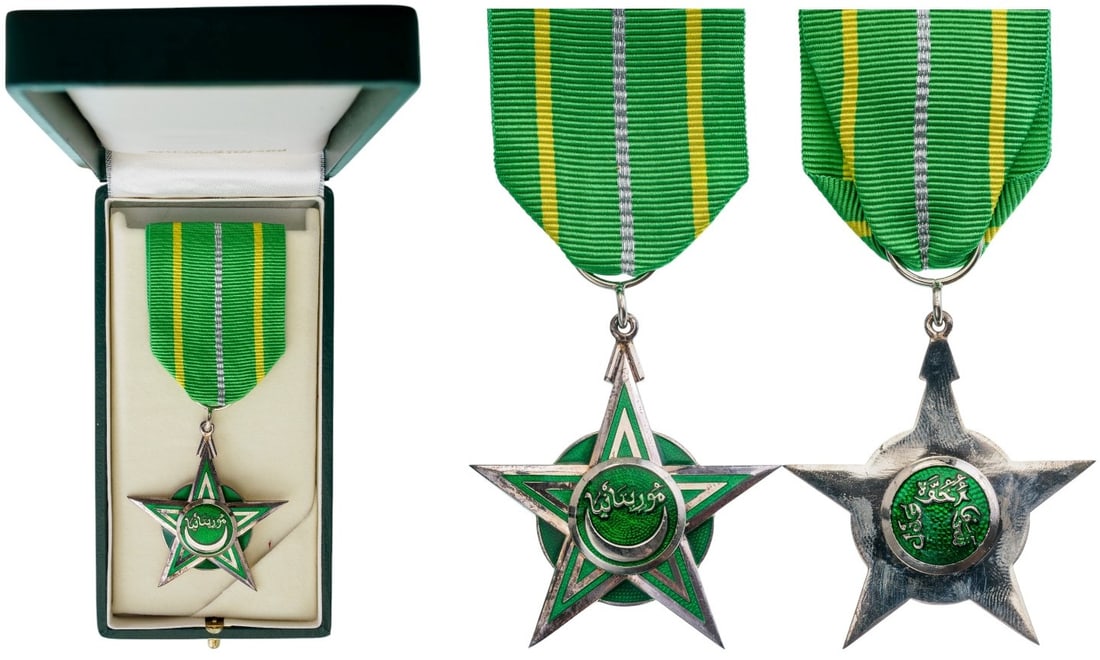 ORDER OF NATIONAL MERIT: Knight's Cross, instituted in 1961. Breast Badge, 50x45 mm., Silver, both sides enameled, original suspension ring and ribbon, in case of issue by "Arthus Bertrand - Paris". Mint state! I