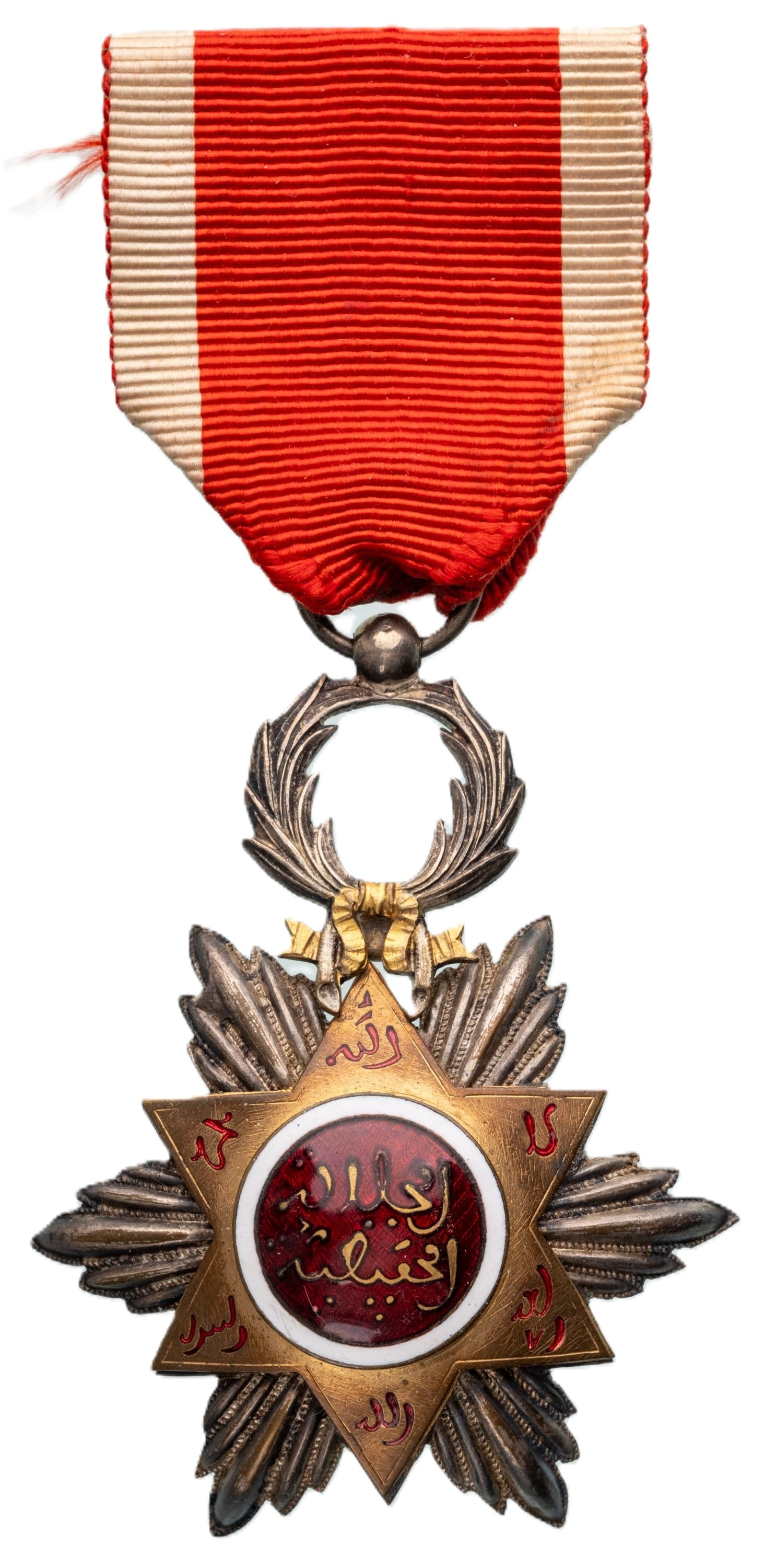 Order of Ouissam Hafidien: Knight's Cross, 5th Class, instituted in 1910. Breast Badge, 65x50 mm., gilt Silver, one side enameled, original suspension ring and ribbon. A rare order in extremely fine condition! I R! I