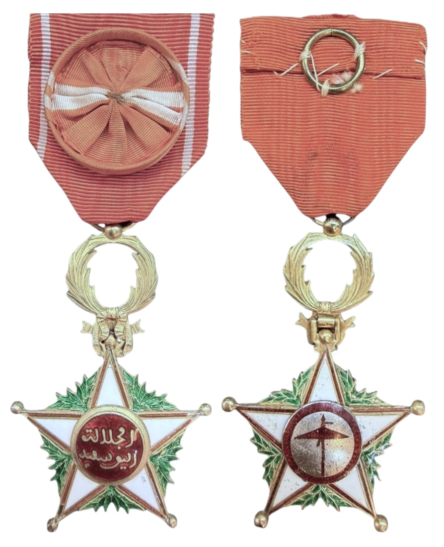 Order of Ouissam Alaouite: Officer's Cross, 1st Type, 4th Class, instituted in 1913. Breast Badge, 64x42 mm., gilt Silver, both sides enameled, original suspension wreath, ring, loop and ribbon with rosette. Rare first model, i