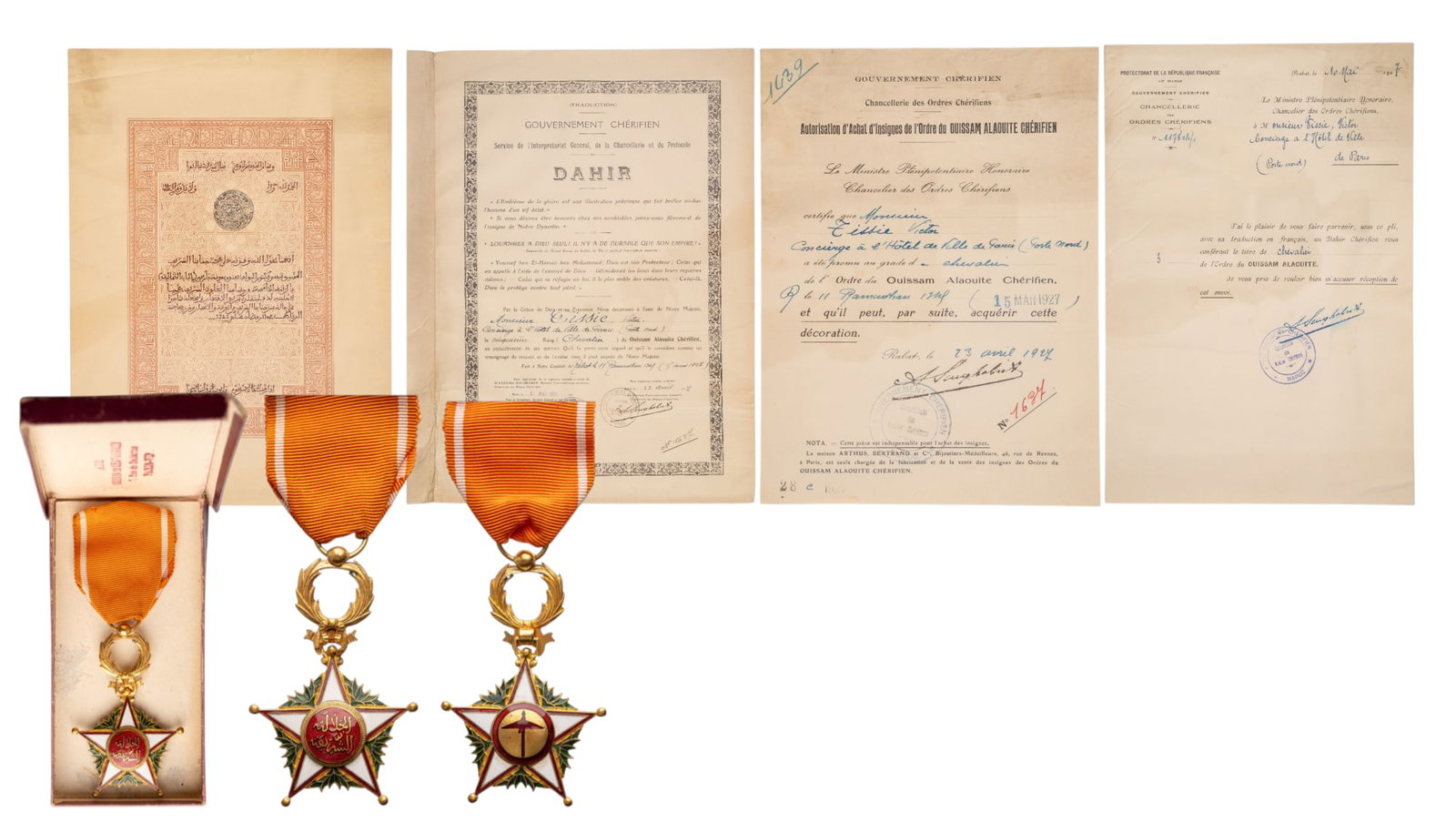 Order of Ouissam Alaouite: Knight's Cross, 2nd Type, 5th Class, instituted in 1913. Breast Badge, 64x41 mm., gilt Bronze, both sides enameled, original suspension ring and ribbon, in damaged case of issue by "Aux Ordres de Chev