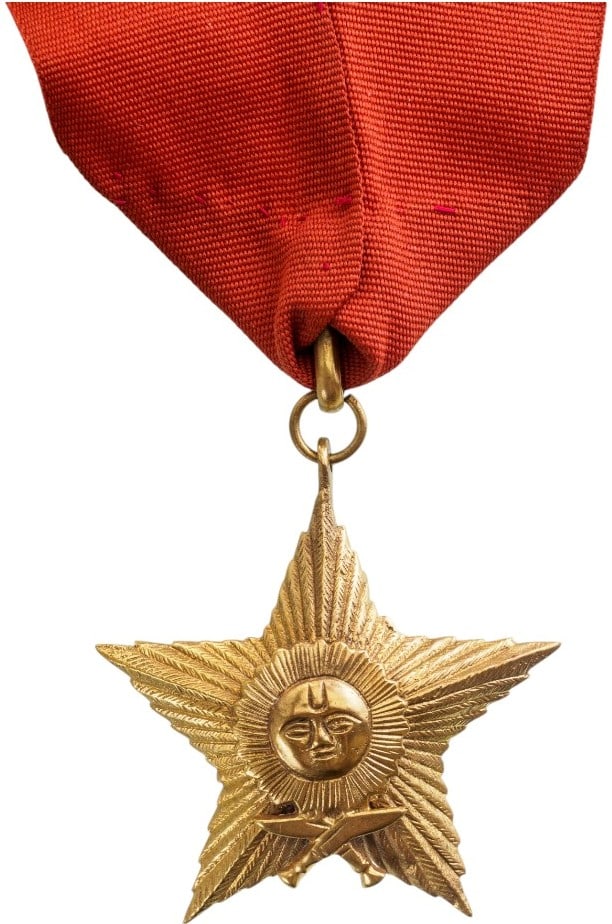 Order of the Gurhka Right Arm: Commander's Cross, instituted in 1895. Neck Badge, 65x59 mm, gilt Bronze, original suspension ring and long ribbon. A superb badge, in extremely fine condition! I
