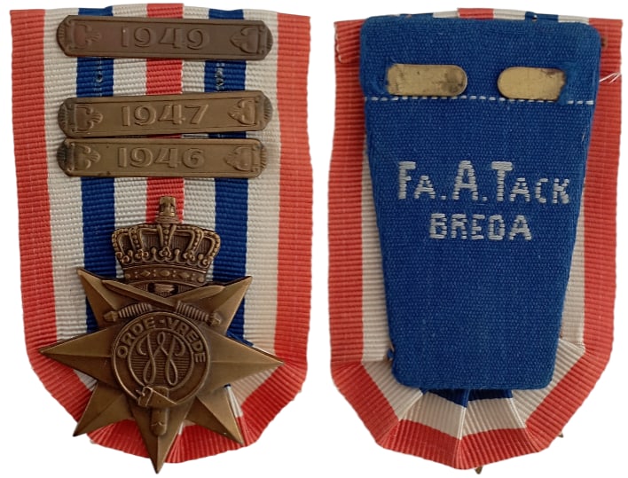 Cross for Order and Peace, with bars "1946, 1947, 1949": Breast Badge, 45x40 mm, Bronze, maker's mark "Fa. A. Tack - Breda", on ribbon, with 3 bronze bars. Extremely fine! I