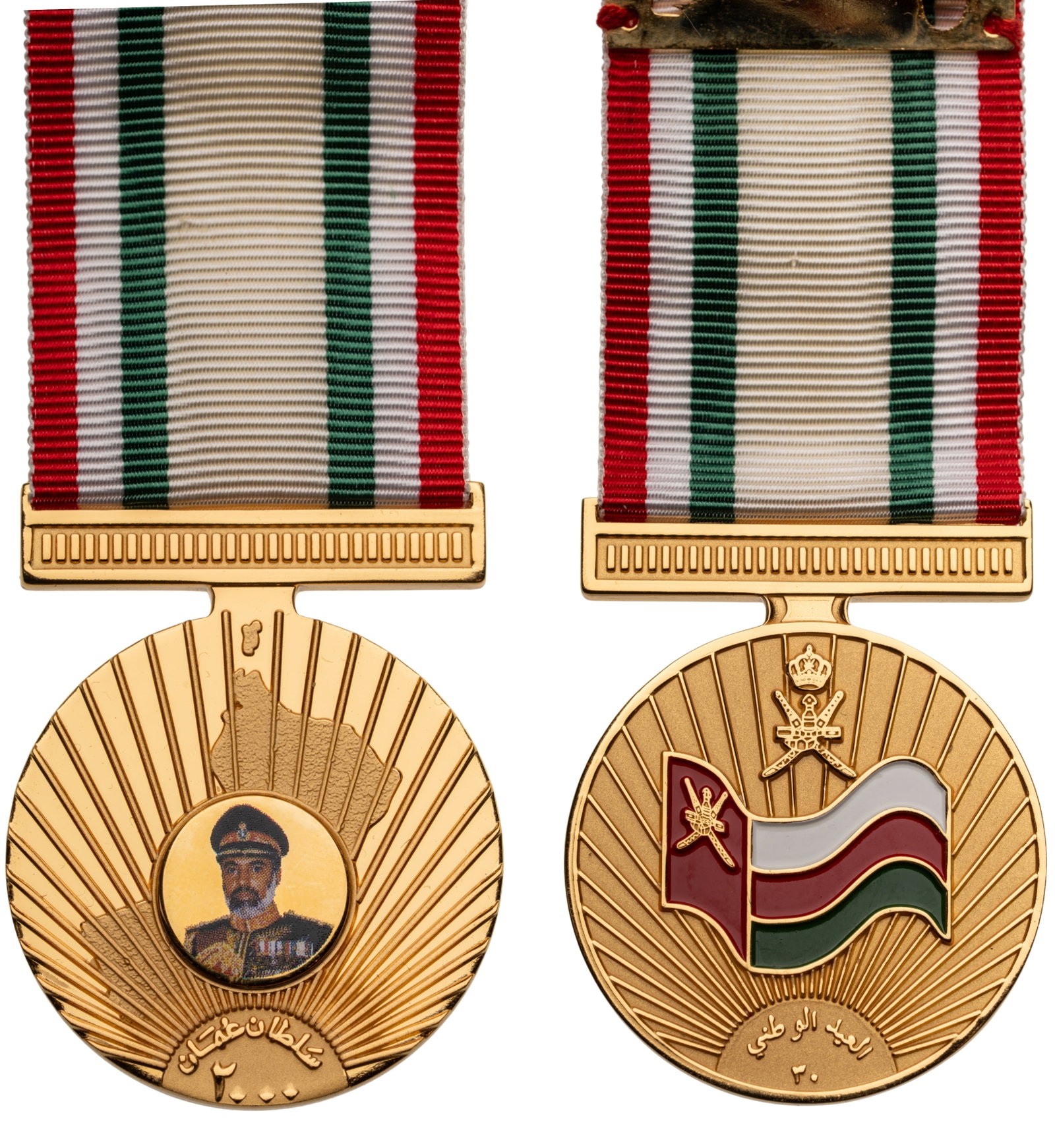 National Day Celebration, 2000, Sultan Qabus ibn Said: Breast Badge, 43x38 mm, gilt Bronze, military bust of Sultan Qabus and flag on reverse enameled, original suspension ring and ribbon. A superbly designed medal, in mint condition! I R!