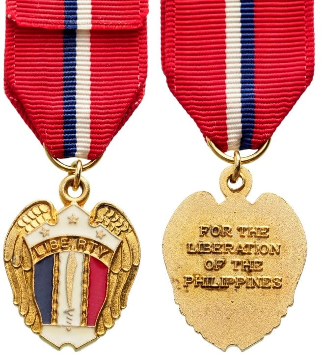 The Philippine Liberation Medal, instituted in 1945: Breast Badge, 22x17 mm., gilt Bronze, enameled, original suspension ring and ribbon. A rare miniature, in mint condition! I R!