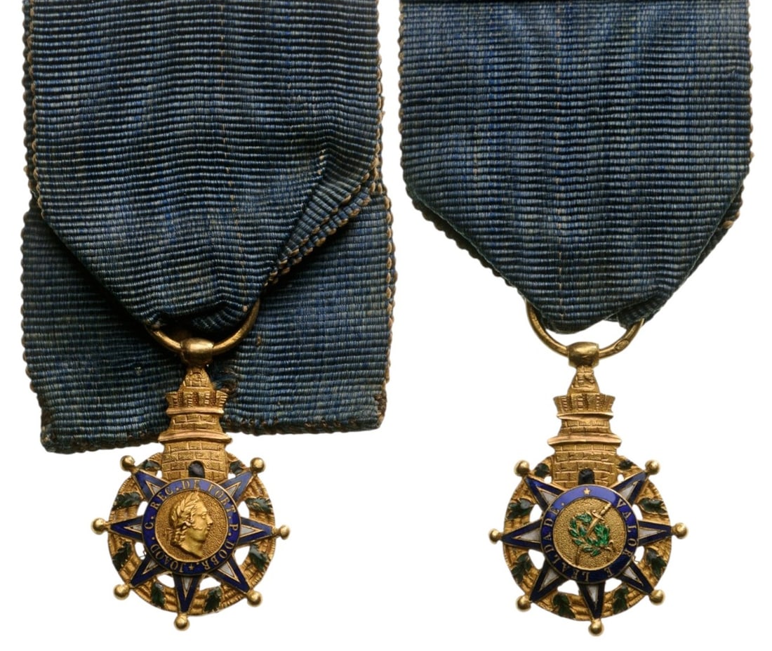 Military Order of the Tower and Sword: An early miniature of the Grand Cross Badge, 15 mm., GOLD and enamels, (the suspension ring, struck with French, gold mark), with original ribbon. A scarce miniature of this rare type of the Order, ex