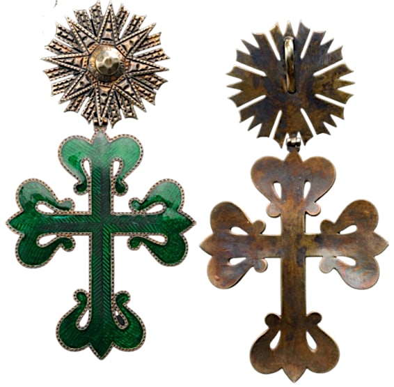 Royal Order of Aviz: A Badge of the Order: finely chiselled and engraved gilt silver cross, 134x70 mm., green enameled to the obverse side; hinged suspension in the form of an eight-pointed star with straight beams betwee