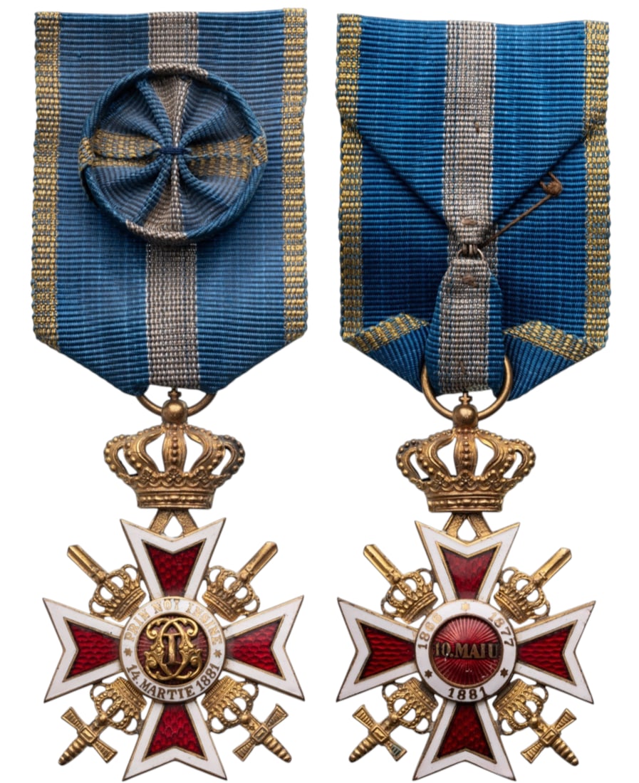 ORDER OF THE CROWN OF ROMANIA, 1881: Officer's Cross 2nd Type, Military. Breast Badge, 56x37 mm, gilt Bronze, both sides enameled, original suspension ring and ribbon with rosette. A beautiful cross, in extremely fine condition! I-