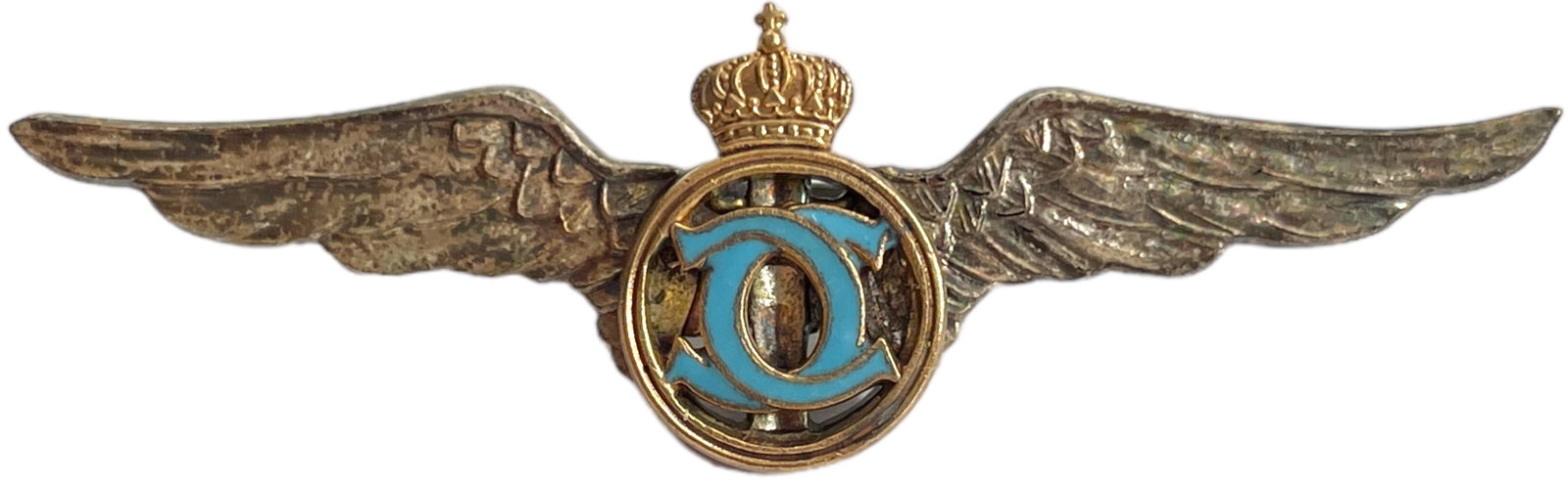 PILOT BADGE FOR GRADUATES OF THE "SPORT AND TOURISM "DEPARTMENT, KING CAROL II MODEL 1931-1940: Breast Badge, 55x20 mm, silvered Bronze, with thin pin on reverse, I.M.S.P.R. 233. Rare! I R!