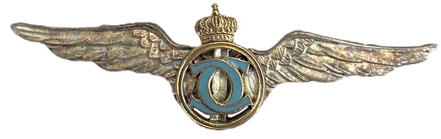 PILOT BADGE FOR GRADUATES OF THE "SPORT AND TOURISM"DEPARTMENT, KING CAROL II MODEL 1931-1940: Breast Badge, 55x20 mm, silvered Bronze, with thin pin on reverse, I.M.S.P.R. 233. Rare! I R!