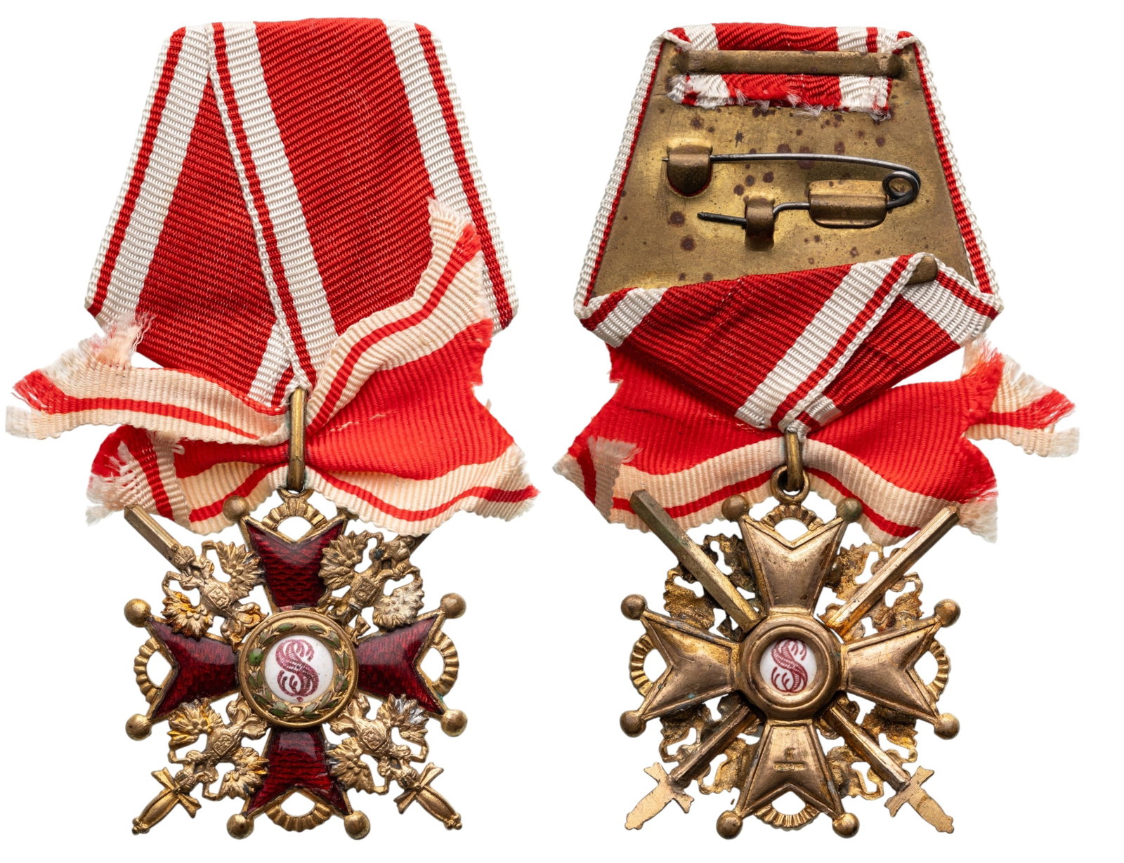 ORDER OF SAINT STANISLAS: Knight`s Cross Military, 4th Class, instituted in 1782. Breast Badge, 41x38 mm., gilt Bronze, unreadable maker's mark, enameled, original suspension ring and ribbon, Extremely fine condition! I