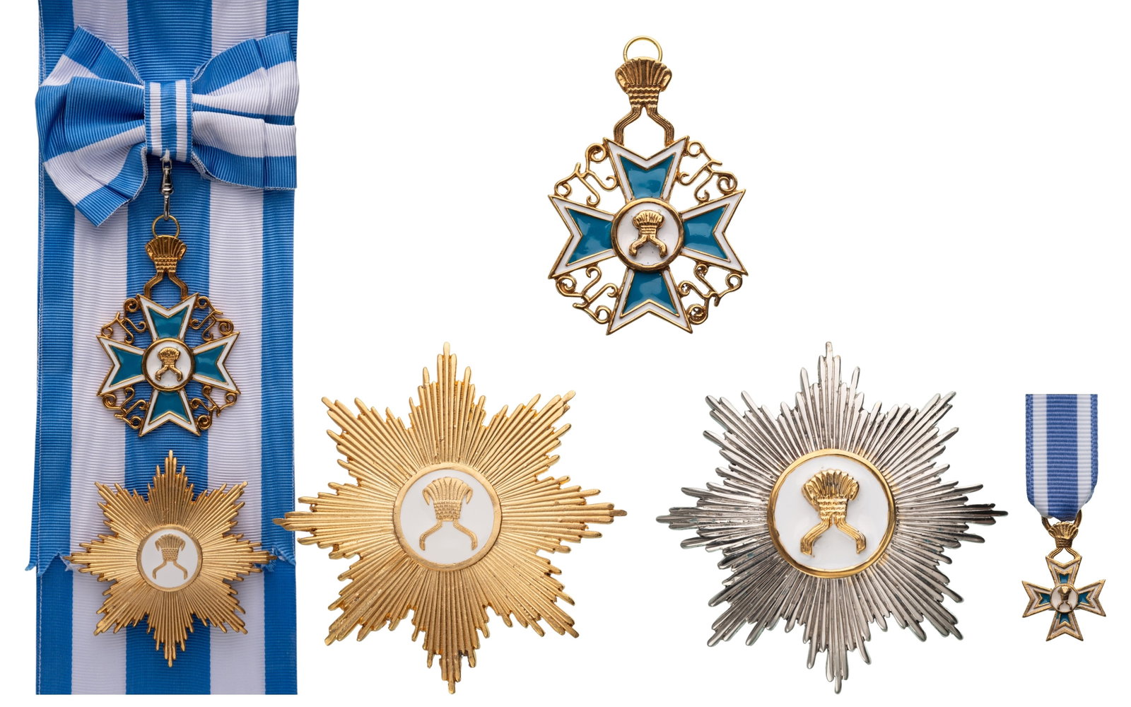 Royal Order of the Crown of Rwanda: Grand Cross Set, 1st Class, instituted in 1950. Sash Badge, 82x59 mm, gilt Bronze, enameled, original suspension ring and long sash. Breast Star, 84 mm., gilt Bronze, 4 pins on reverse, together with 