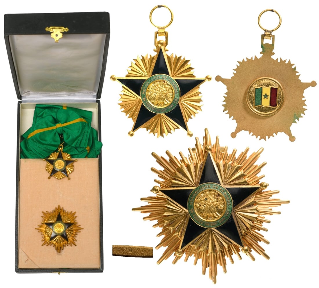 ORDER OF MERIT: Grand Cross Set, instituted in 1960. Sash Badge, 63x58 mm, gilt Bronze, both sides enameled, original suspension device and long complete sash. Breast Star, 78 mm., Silver, hallmarked "925", maker's m