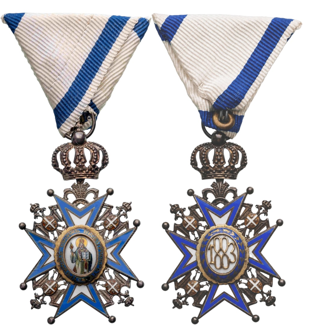 ORDER OF SAINT SAVA: Knight's Cross, 3rd Model, 5th Class, instituted in 1883. Breast Badge, 67x41 mm, Silver, enameled, original suspension with crown, ring and triangular modern ribbon. Very fine condition! II