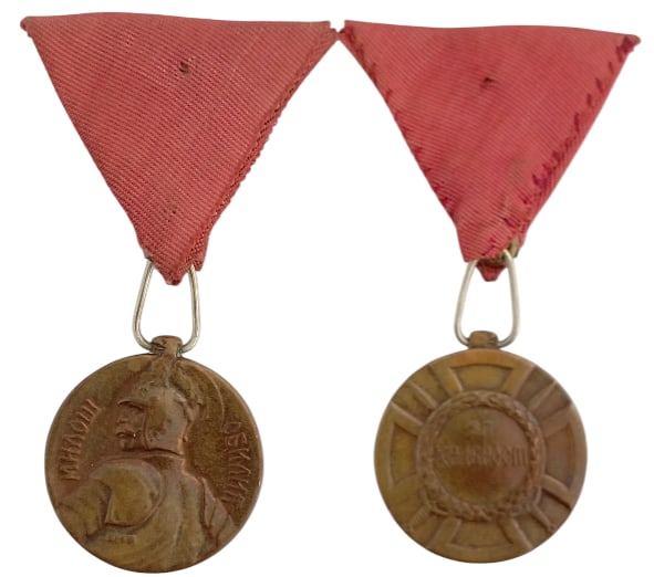Milos Obilic Bravery Medal, 1912: 3rd Class. Breast Badge, 34x31 mm, Bronze, private suspension ring and ribbon. I