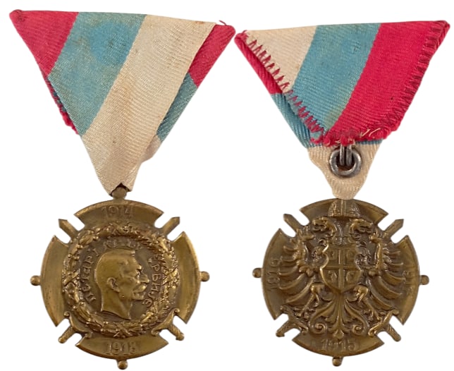 Commemorative Cross for the 1914-1918 War of Liberation and Union: Breast Badge, 39 mm, Bronze, original suspension ring and triangular ribbon. I