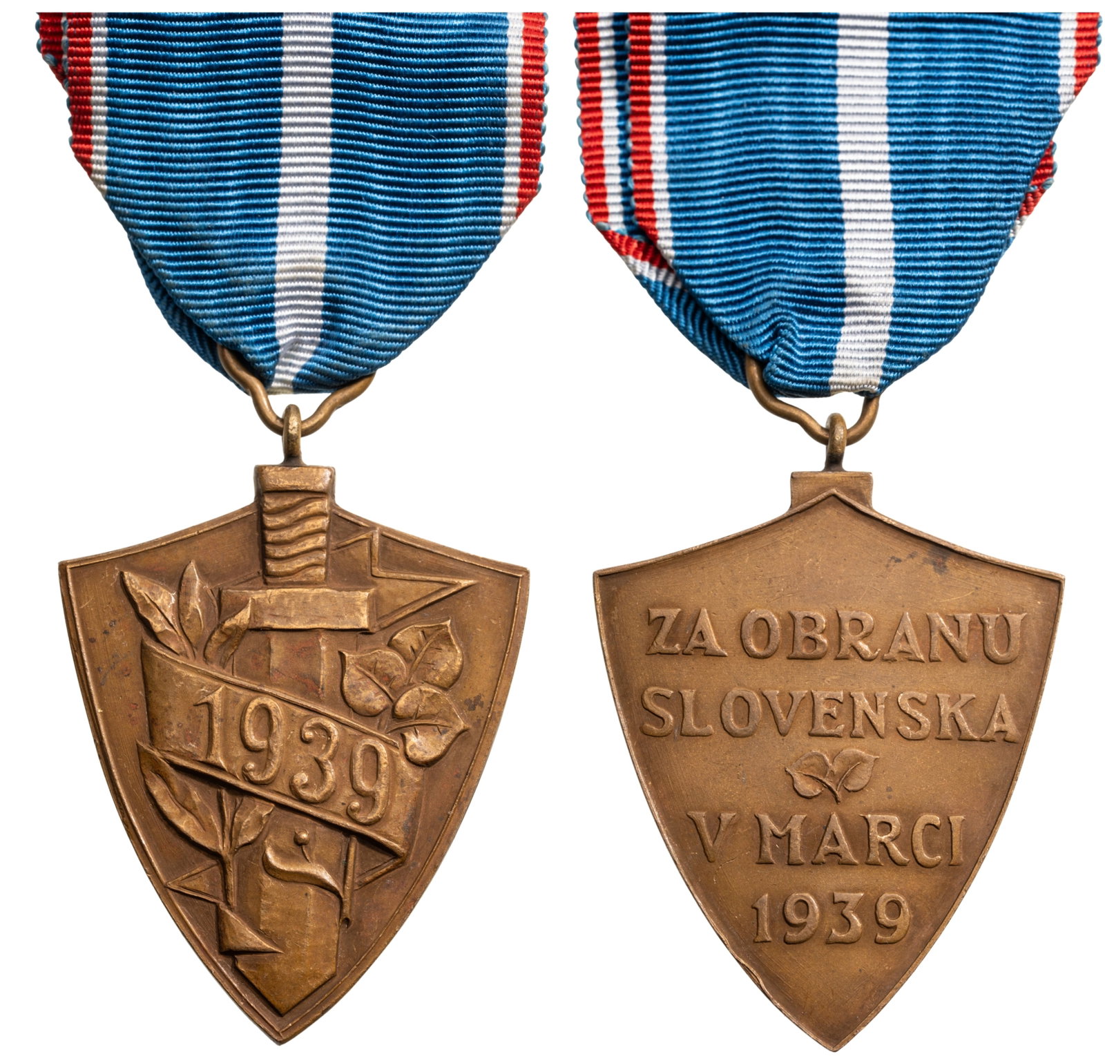 Defense of Slovakia Commemorative Medal, 1939: Breast Badge, 50x36 mm, Bronze, original suspension ring and ribbon. I