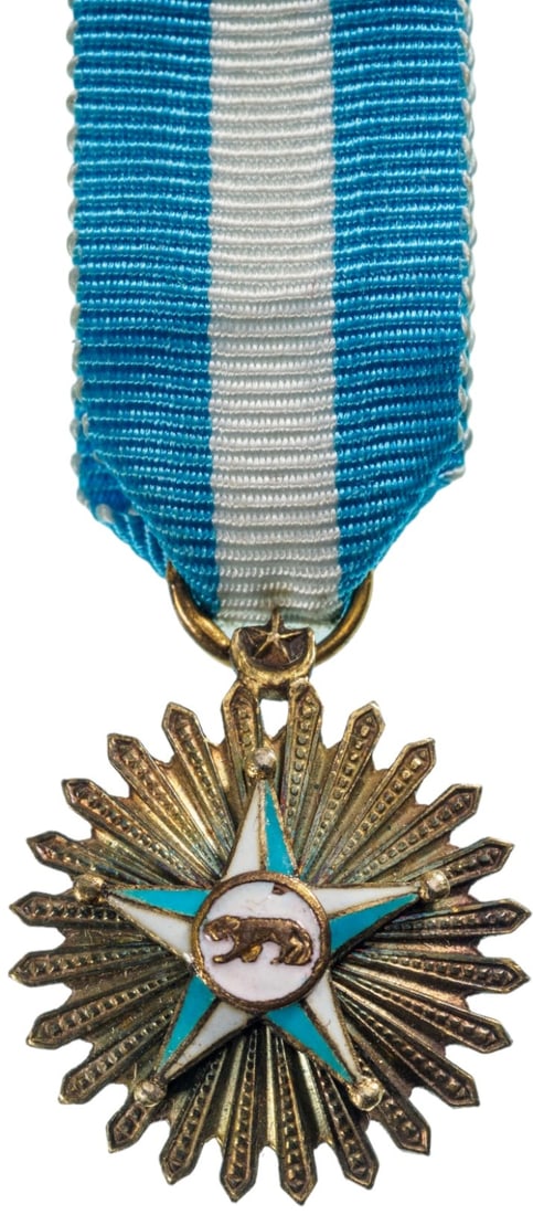 ORDER OF THE STAR: Grand Cross Star Miniature, 1st Class, instituted in 1961. Breast Badge, 18x16 mm, gilt Silver, central star enameled, original suspension ring and ribbon. A very rare and superb miniature! I RR!