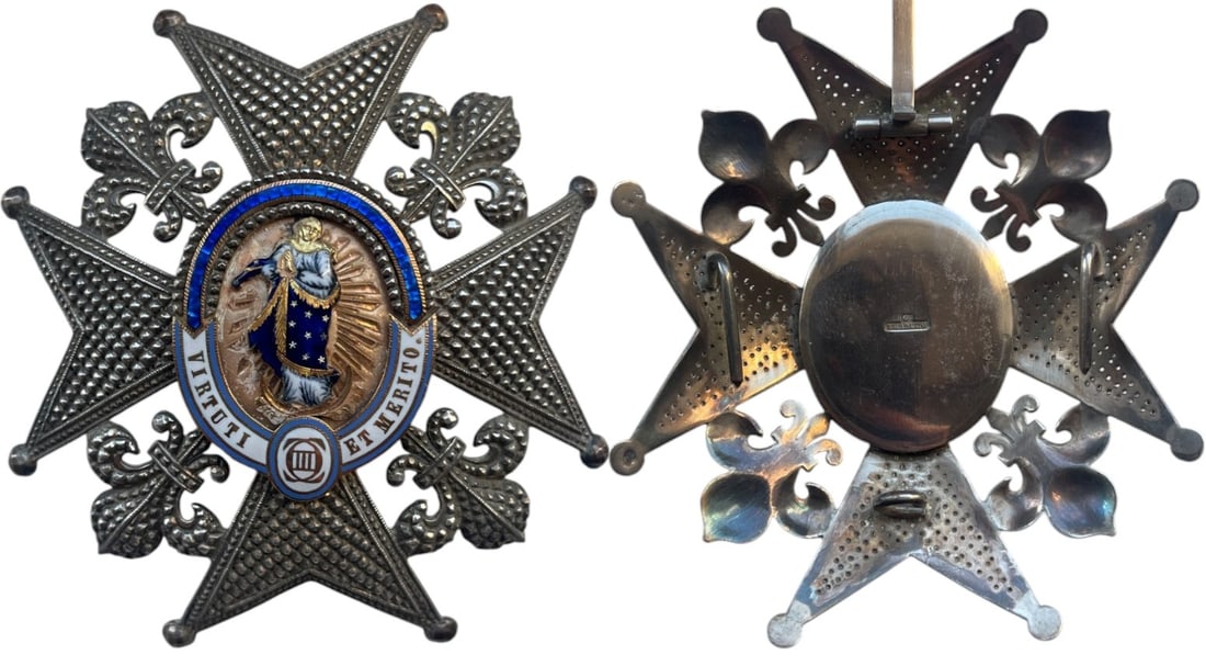 ORDER OF CHARLES III: Grand Cross Breast Star from the second part of the 19th Century, 86x81 mm, diamond-cut chiselled Silver cross, maker's mark "G. Yraburo Madrid" fleurs-de-lys, oval centre medallion with the polychrom