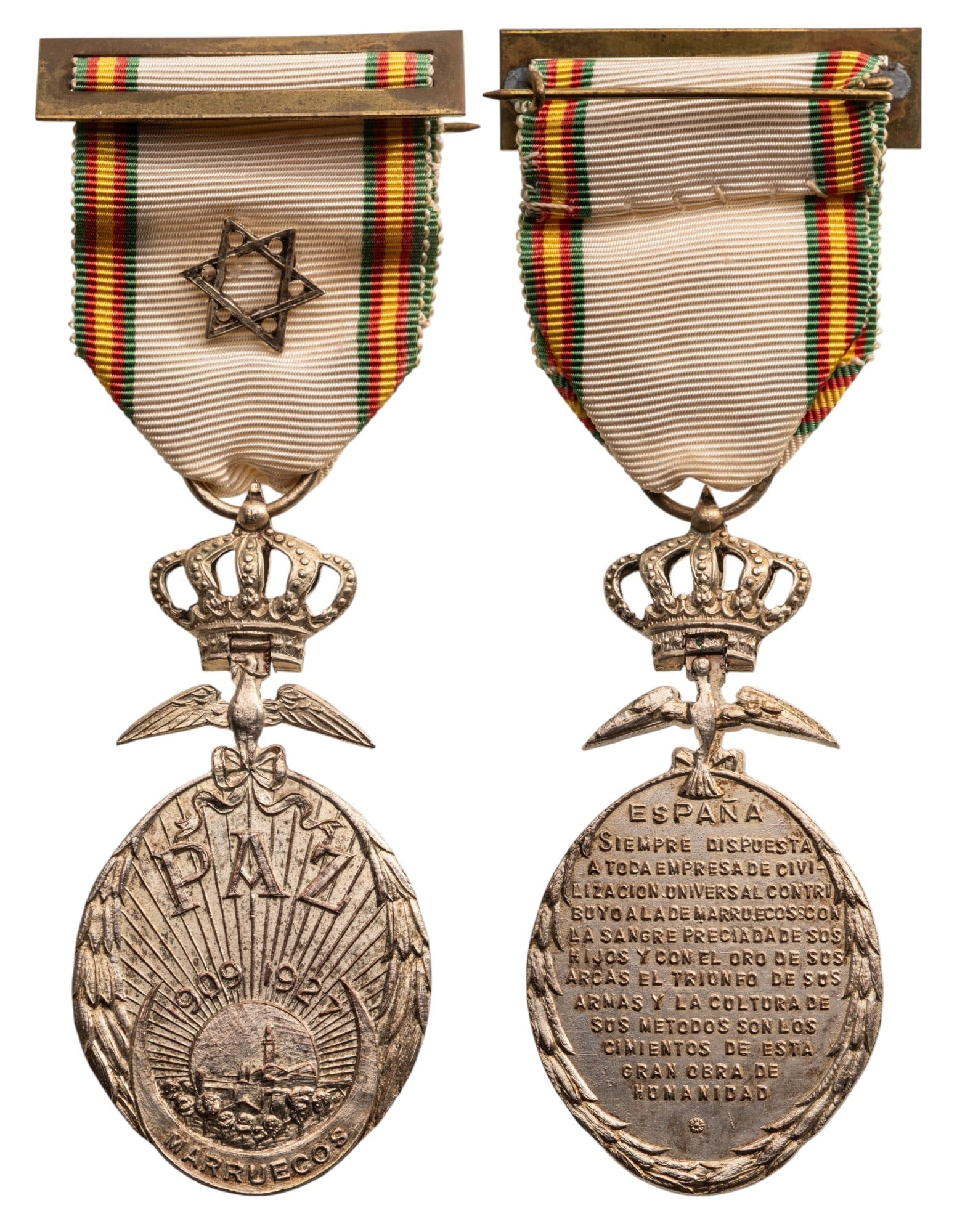 Morocco Peace Medal, 1927: Breast Badge, 61x31 mm, silvered, original suspension ring and ribbon, with star and silver bar, awarded to those who participated at the "Rif" Campain between 1909 and 1927. Extremely fine condition!