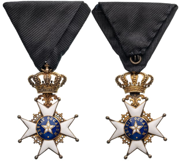 Order of the Polar Star: Knight's Cross, instituted in 1748. Breast Badge, 58x37 mm, gilt Silver, enameled (minor damages), GOLD centers, original suspension ring and ribbon. Very fine condition. II