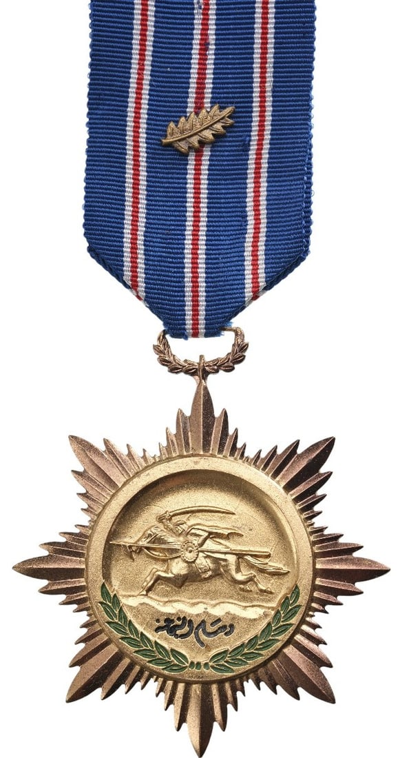 Order of Bravery, 1st Class, 1964: Breast Badge, 68x60 mm, gilt Bronze, enameled, original suspension ring and ribbon with gilt palm. Mint stateI I