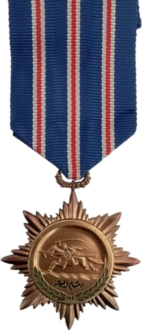 Order of Bravery, 3rd Class, 1964: Breast Badge, 40 mm, gilt Bronze, enameled, original suspension ring and ribbon. Mint stateI I