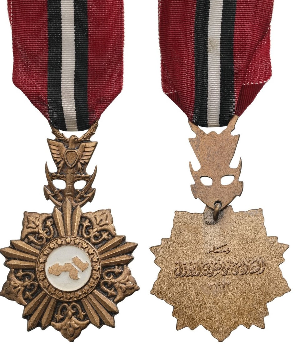 Order of the 6th of October: Breast Badge, 66x46 mm, gilt Bronze, enameled, original suspension device and ribbon. Mint stateI I
