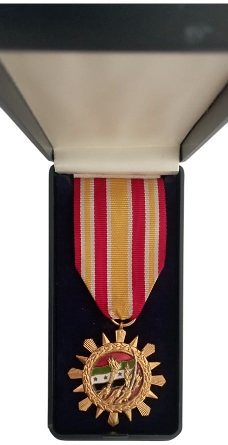 Army Long & Exemplary Service Medal: Breast Badge, 39 mm, Bronze, enameled, original suspension ring and ribbon, in case of issue. Mint stateI I