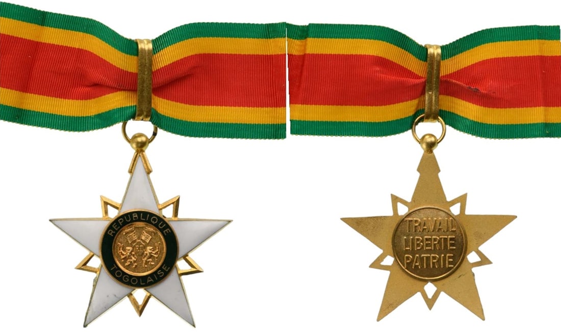 Order of Mono: Commander's Cross, instituted in 1961. Neck Badge, 63x58 mm, gilt Bronze, maker's mark "A. B. - Arthus Bertrand - Paris", one side enameled, original suspension ring and long complete ribbon. A superb
