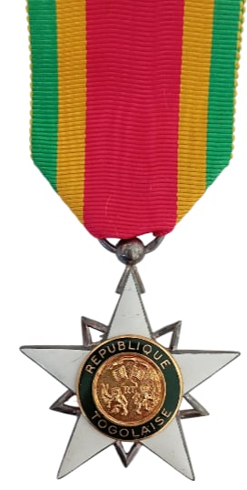 Order of Mono: Knight's Cross, instituted in 1961. Breast Badge, 45x40 mm, gilt Silver, enameled, reverse missing, original suspension ring and ribbon. Very fine condition! IV