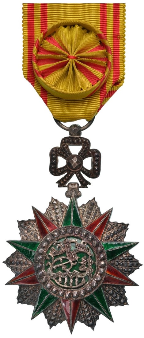 ORDER OF NICHAN AL IFTIKHAR: Officer's Cross, 4th Class, Muhammad al Habib (1922-1929. Breast Badge, 76x51 mm, Silver, one side enameled, original suspension ring and ribbon with rosette. A superb high jeweller's quality! I