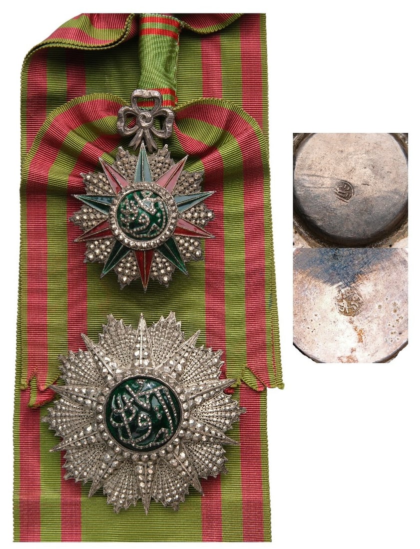 ORDER OF NICHAN AL IFTIKHAR: Grand Cross Set, 1st Class, Sidi Ahmed (1929 - 1942). Sash Badge, 82x58 mm, Silver, partially enameled, original suspension ring, loop and sash. Breast Star, 80 mm, Silver, partially enameled, origina