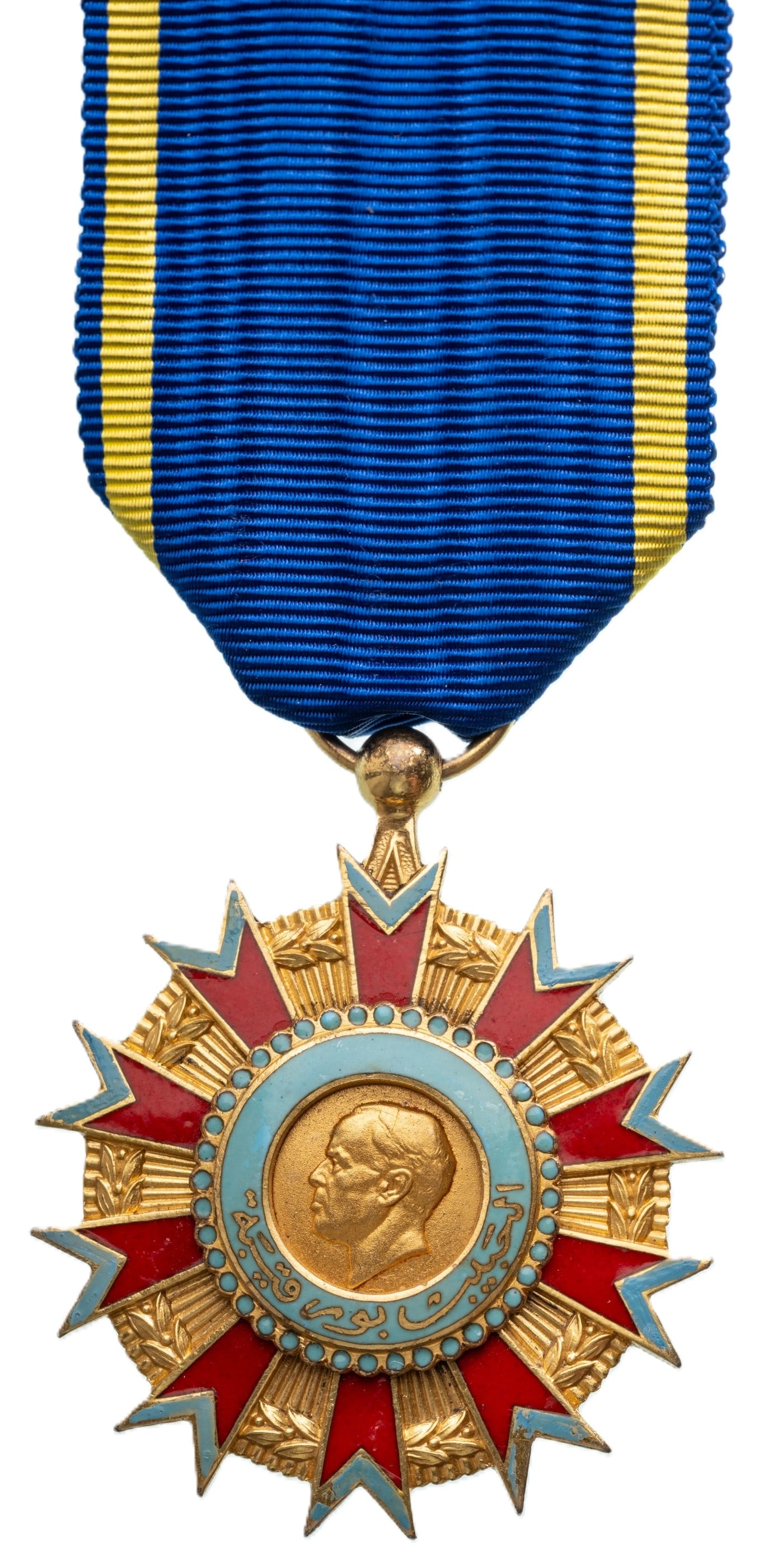 Order of Merit Bourghiba: Knight's Cross, 5th Class, instituted in 1963,. Breast Badge, 47x40 mm, gilt Silver, hallmarked, one side enameled, original suspension ring and ribbon. A beautiful and rare order, in extremely fine c