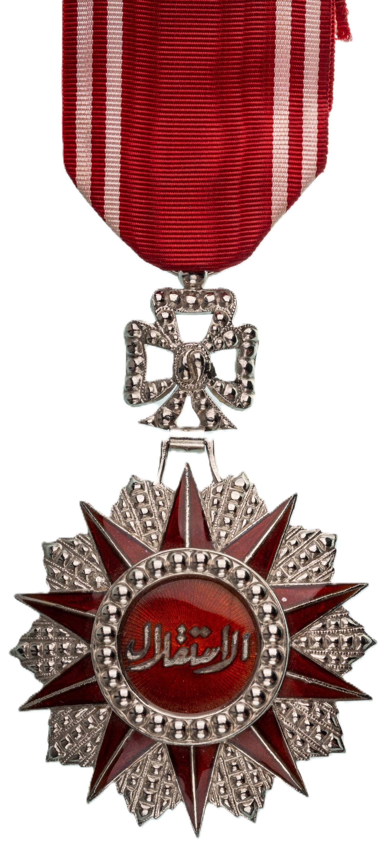 Order of Independence: Knight's Cross, 5th Class, instituted in 1965,. Breast Badge, 79x51 mm, Silver, one side enameled, original suspension ring and ribbon. A beautiful order, in extremely fine condition. I