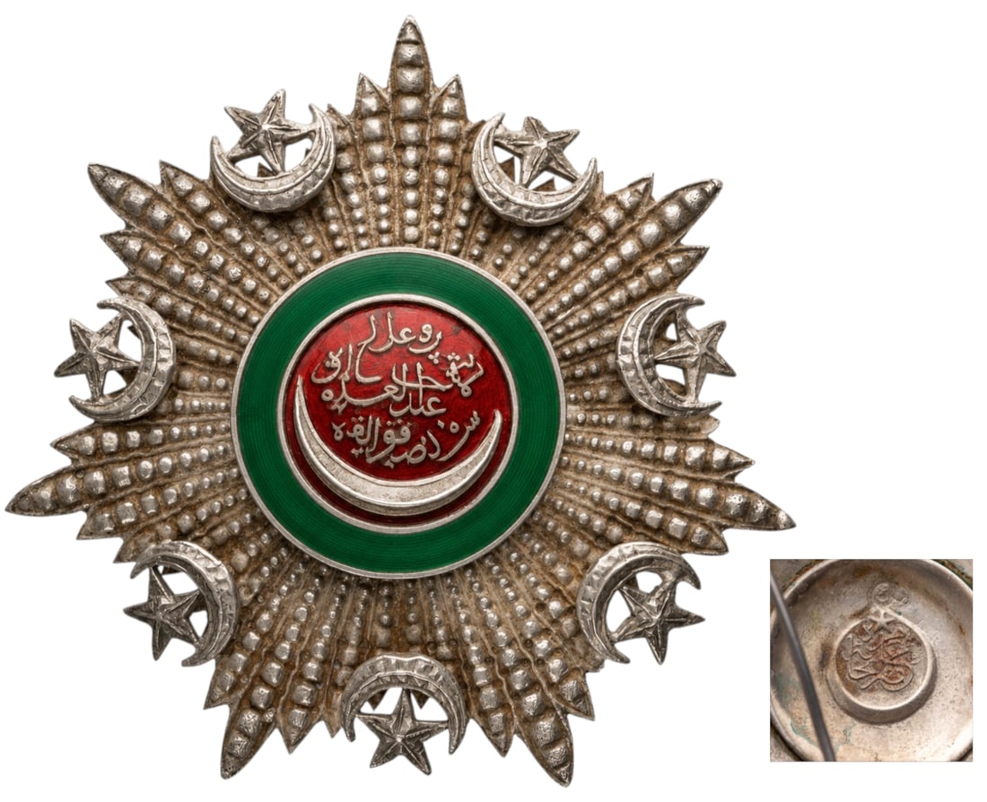 ORDER OF OSMANI: Grand Officer's Star, 2nd Class. Breast Star, 75 mm., Silver, enameled centre medallion with the Sultan`s Tughra, original medium pin on reverse and two side hooks. An interesting star of very unusual