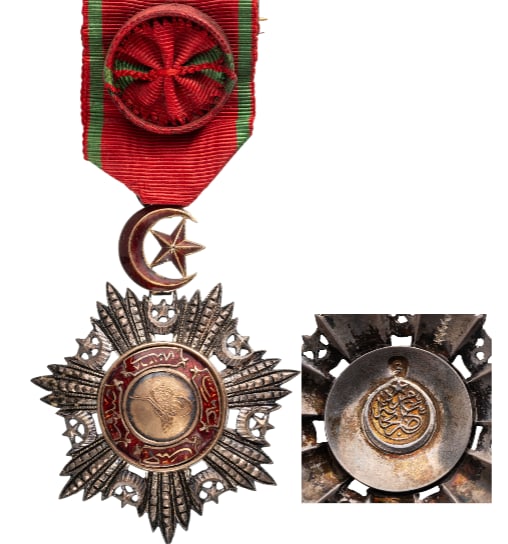 Order of Mecidi: Officer's Cross, 4th Class. Breast Badge, 73x59 mm., Silver, enameled, chiseled and pierced silver with gold centre medallion also with the Sultan`s Tughra, with red enameled details and applied scrol