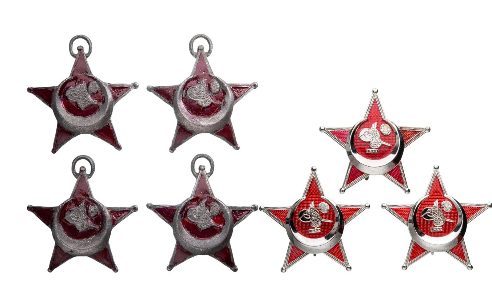 Gallipoli Star, 1915, Lot of 7: Lot of 7. Breast Stars, 58 mm., silvered, enameled, horizontal pin on reverse. A group of collector's copies, in extremely fine condition! I (7)