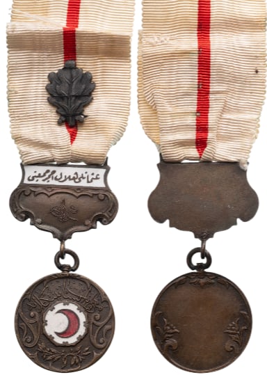 Red Crescent Medal (Hilel I Ahmer Madalyasi): 3rd Class, instituted in 1912. Breast Badge, 60x28 mm, Bronze, original suspension enameled device, ring and ribbon. Extremely fine condition. I.