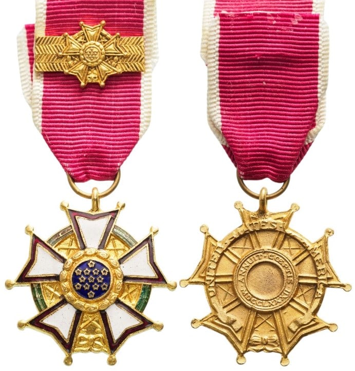 Legion of Merit, Chief Commander Miniature, instituted in 1942: Breast Badge, 24 mm., gilt Bronze, one side enameled, original suspension ring and ribbon with gilt bar. A superb miniature, in extremely fine condition! I