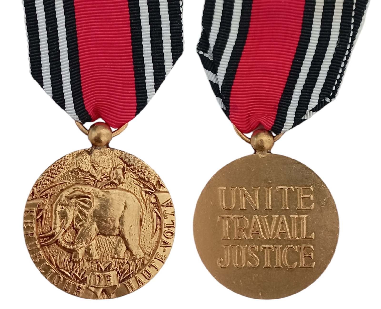 Order Of Merit Of Upper Volta: 1st Class, instittued in 1959. Breast Badge, 42x36 mm., gilt Bronze, original suspension ring and ribbon. Mint state!I