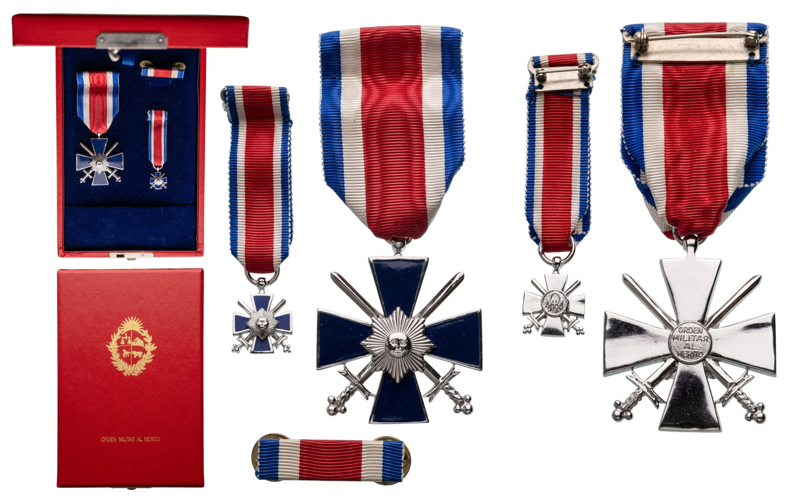 Military Order of Merit of the Companions of Artigas: Knight's Cross, 5th Class, instituted in 1979. Breast Badge, 47x41 mm, silvered Bronze, original suspension ring and ribbon, together with miniature and lapel bar, in case of issue by "N.S. Meyer
