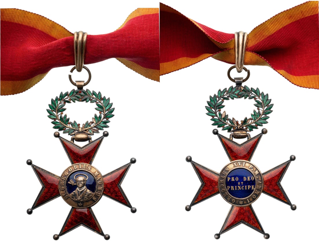 The Pontifical Equestrian Order of St. Gregory the Great: Commander's Cross, 3rd Class, instituted in 1831. Neck Badge, 83x56 mm, gilt Silver, with red enameled arms, suspension wreath, ring, loop and original neck ribbon. A superb 19th century, luxury fabri