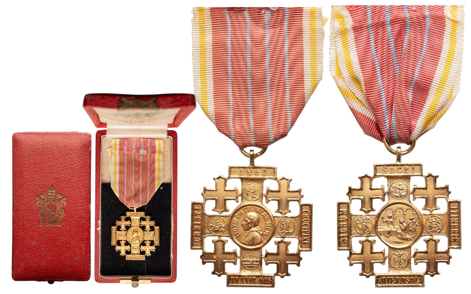 Jerusalem Pilgrim's Cross: Breast Badge, instituted in 1901, 39x34 mm, gilt Bronze, original suspension ring and ribbon, in case of issue by "Tanfani, Roma", with gilt weapon on the lid. Exremely fine and attractive! I