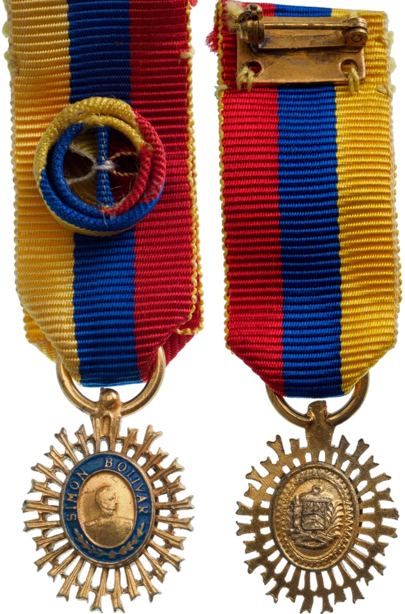 Order of the Libertador, instituted in 1880: Officer's Cross Miniature, instituted in 1980. Breast Badge, 17x15 mm,, gilt Copper, superimposed parts enameled, original suspension ring and ribbon with rosette. Very attractive badge, in mint state